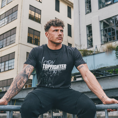 Topfighter T-Shirt „Arbeite härter als je zuvor“ • Schwarz